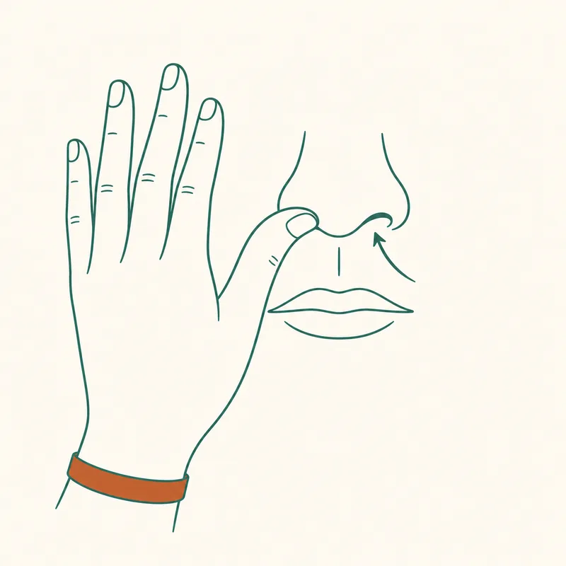 Front-of-face diagram with the right nostril closed and an arrow showing breath entering through the open left nostril.